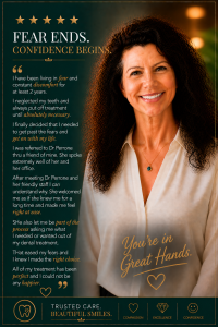 A smiling woman with dark, curly hair shares her positive dental experience, emphasizing confidence and comfort in treatment.